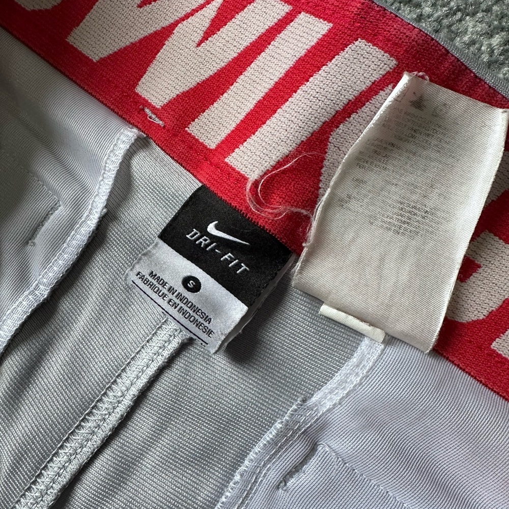 Nike Men’s Gray Baseball Pants red stripes. Size Small